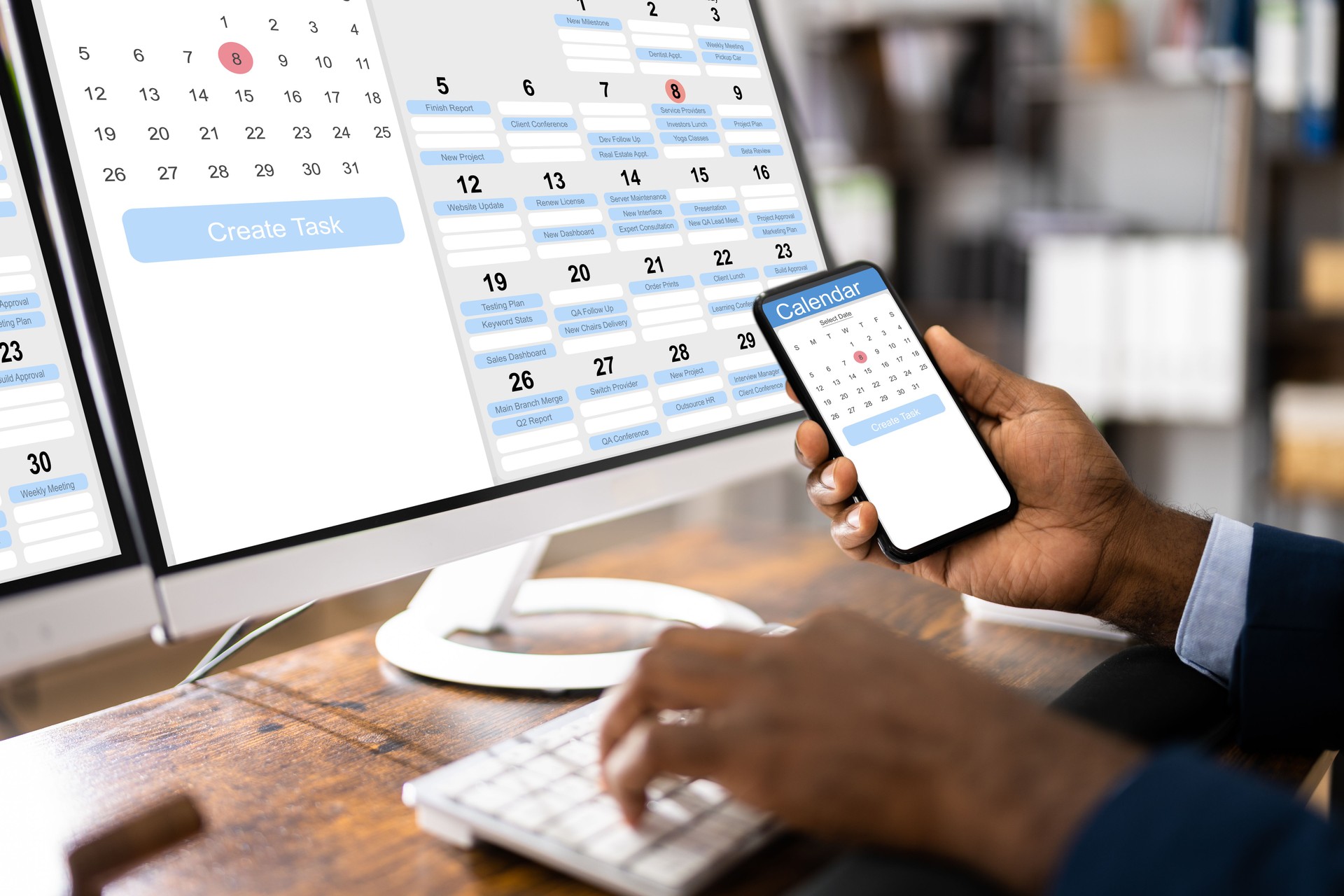 African Man Organizing Appointment Schedule Using Cellphone